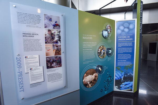 Three exhibition panels detailing NCMI’s work regarding the H1N1 flu pandemic. 