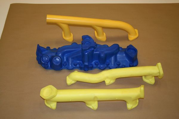 Yellow and blue foam engine parts